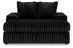 Diamond Furniture - Ashley Furniture - Midnight-Madness 4-Piece Sectional and Oversized Chaise - 4-Piece Sectional and Oversized Chaise / Onyx - 98103U2