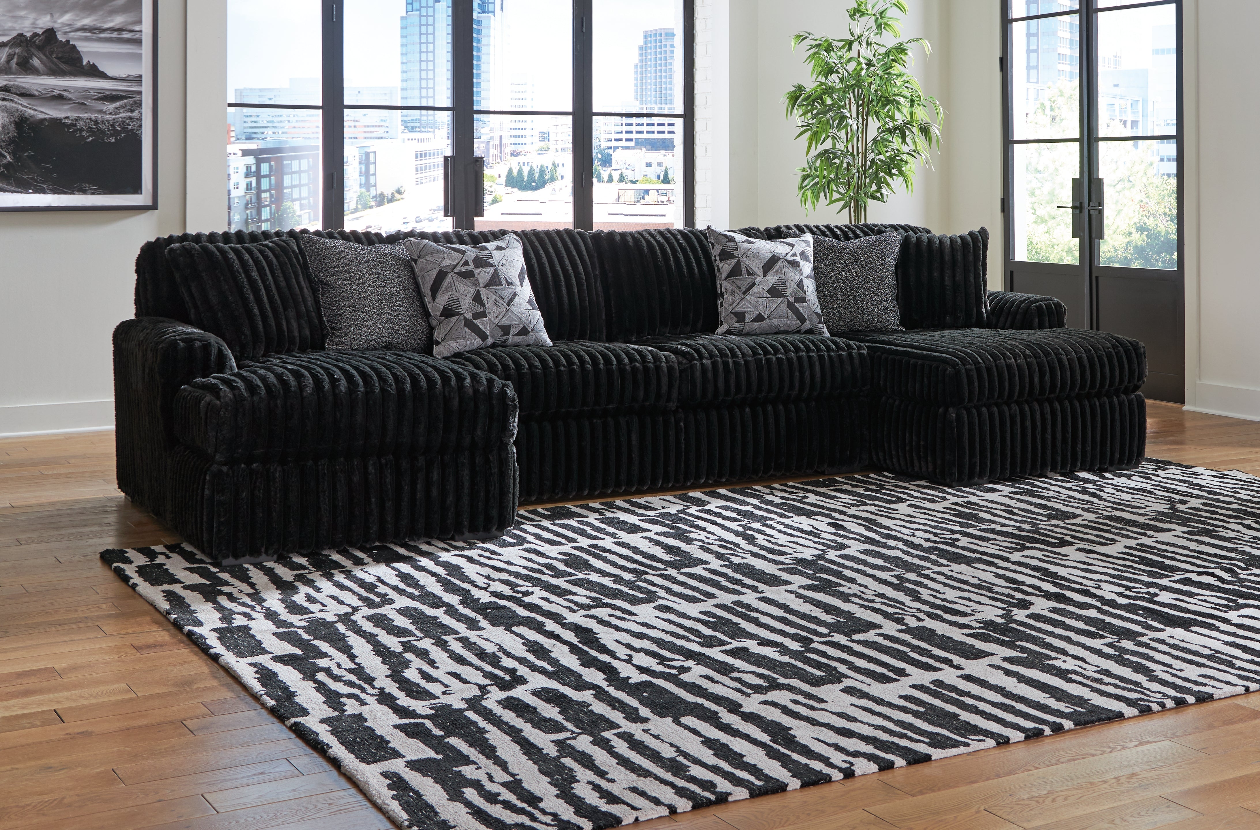 Diamond Furniture - Ashley Furniture - Midnight-Madness 3-Piece Sectional with Chaise - RAF 3-Piece Sectional with Chaise - 98103S5
