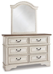 Realyn Full Upholstered Panel Bed, Dresser, Mirror, Chest and 2 Nightstands