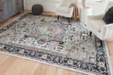 Diamond Furniture - Ashley Furniture - Gregmoore 7'9" x 9'11" Washable Rug - 7'9" x 9'11" Washable Rug - R405821