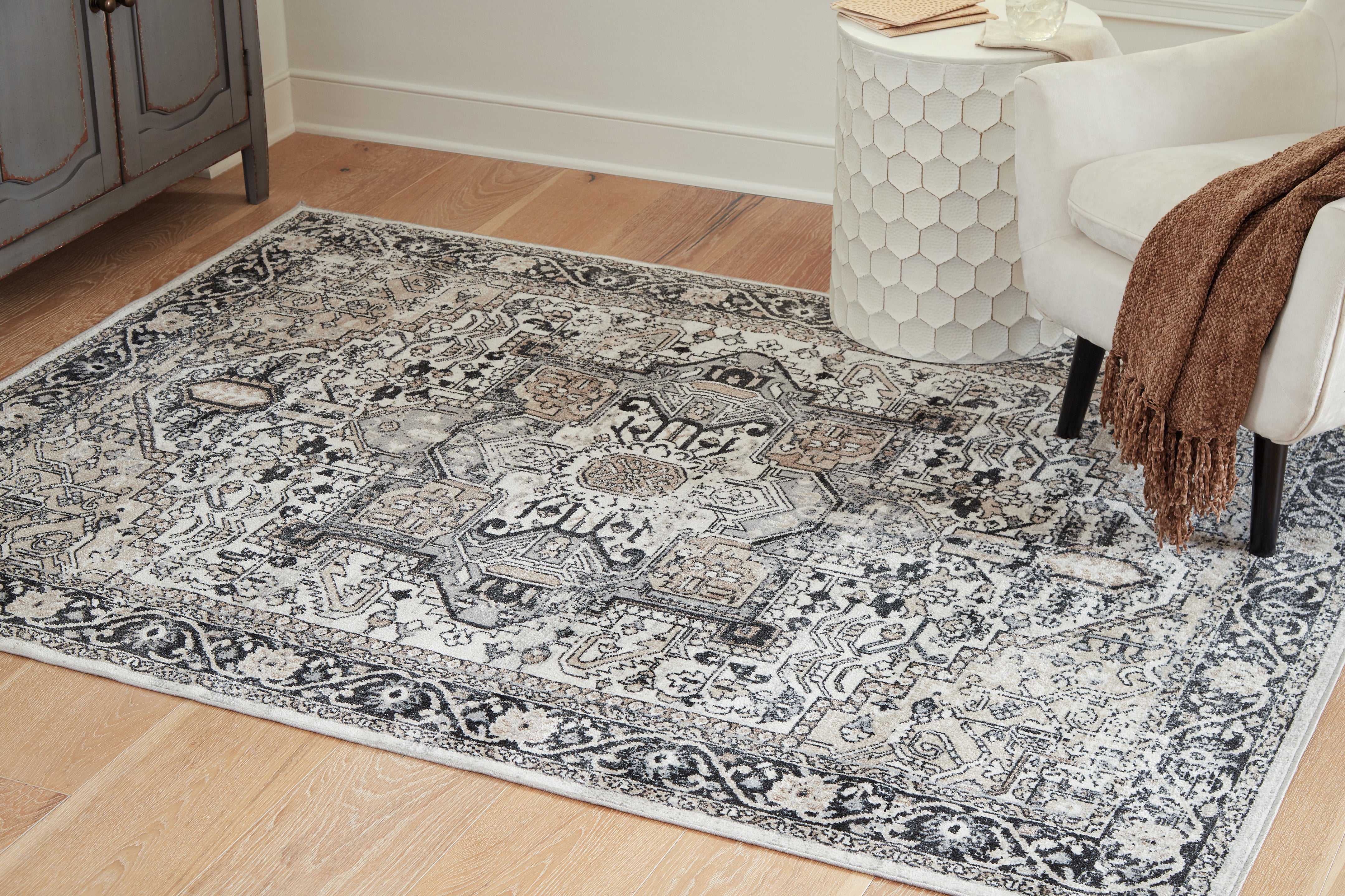 Diamond Furniture - Ashley Furniture - Gregmoore 5'2" x 6'10" Washable Rug - 5'2" x 6'10" Washable Rug - R405822