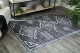 Diamond Furniture - Ashley Furniture - Arloman 5' x 7' Washable Rug - 5' x 7' Washable Rug - R405932