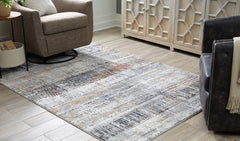 Diamond Furniture - Ashley Furniture - Rhettner 5'3" x 7'3" Rug - 5'3" x 7'3" Rug - R406072