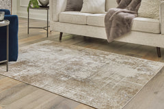 Diamond Furniture - Ashley Furniture - Grifflain 5'1" x 7' Washable Rug - 5'1" x 7' Washable Rug - R406232