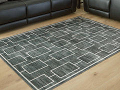 Diamond Furniture - Ashley Furniture - Elderland Washable 5' x 7' Area Rug - Washable 5' x 7' Area Rug - R407402