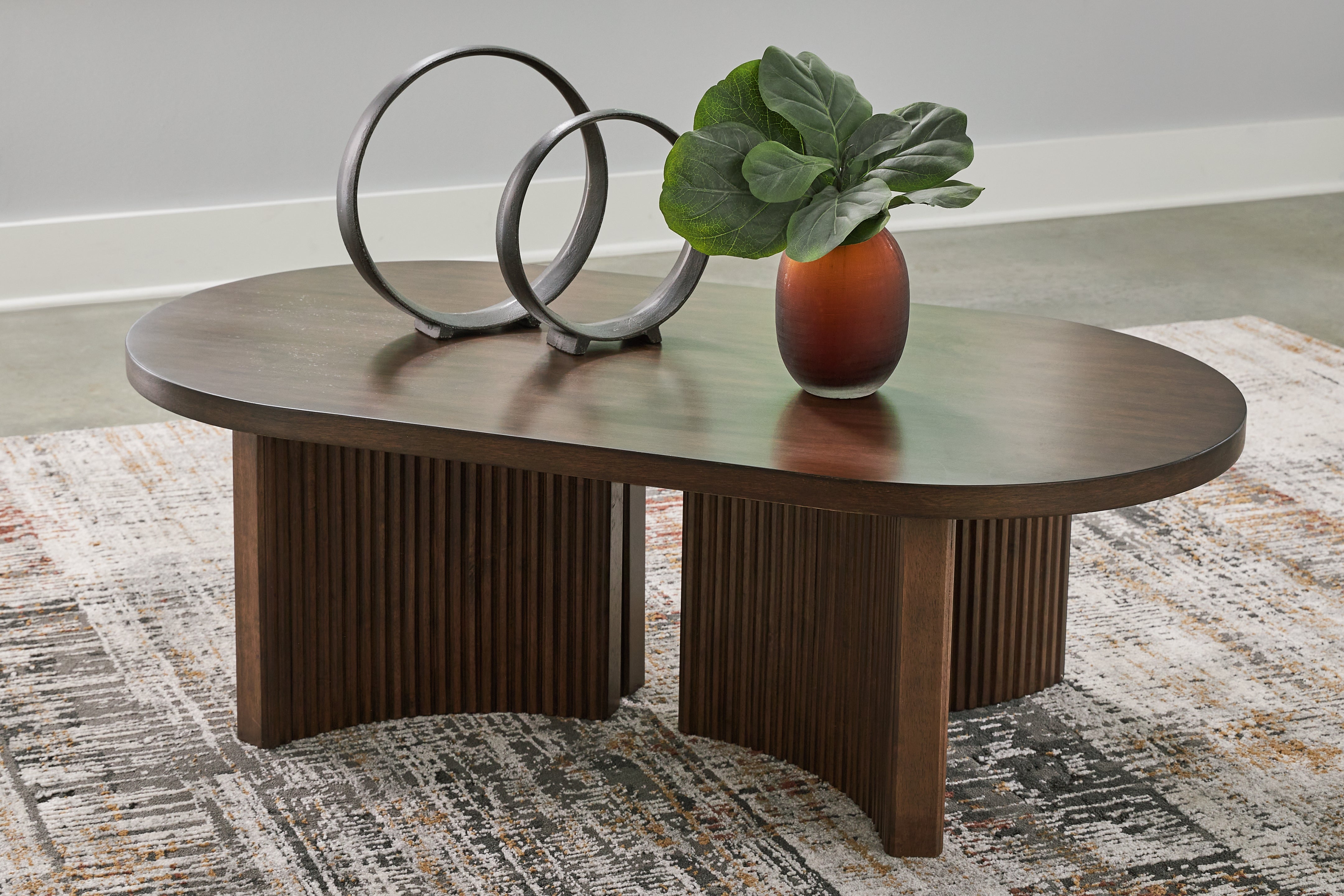 Diamond Furniture - Ashley Furniture - Korestone Coffee Table - Oval Cocktail Table - T689-0