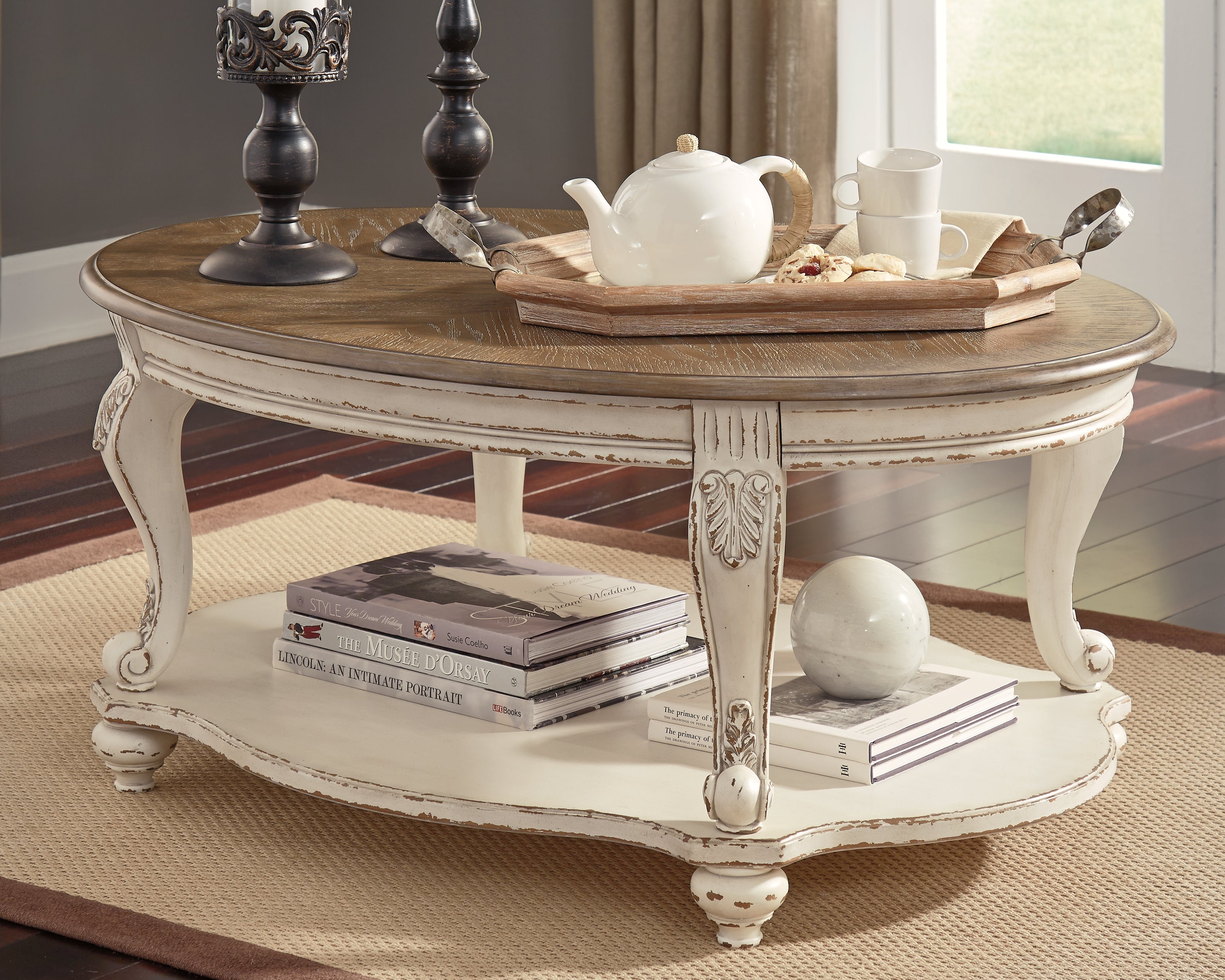 Diamond Furniture - Ashley Furniture - Realyn Coffee Table - Oval Cocktail Table - T743-0