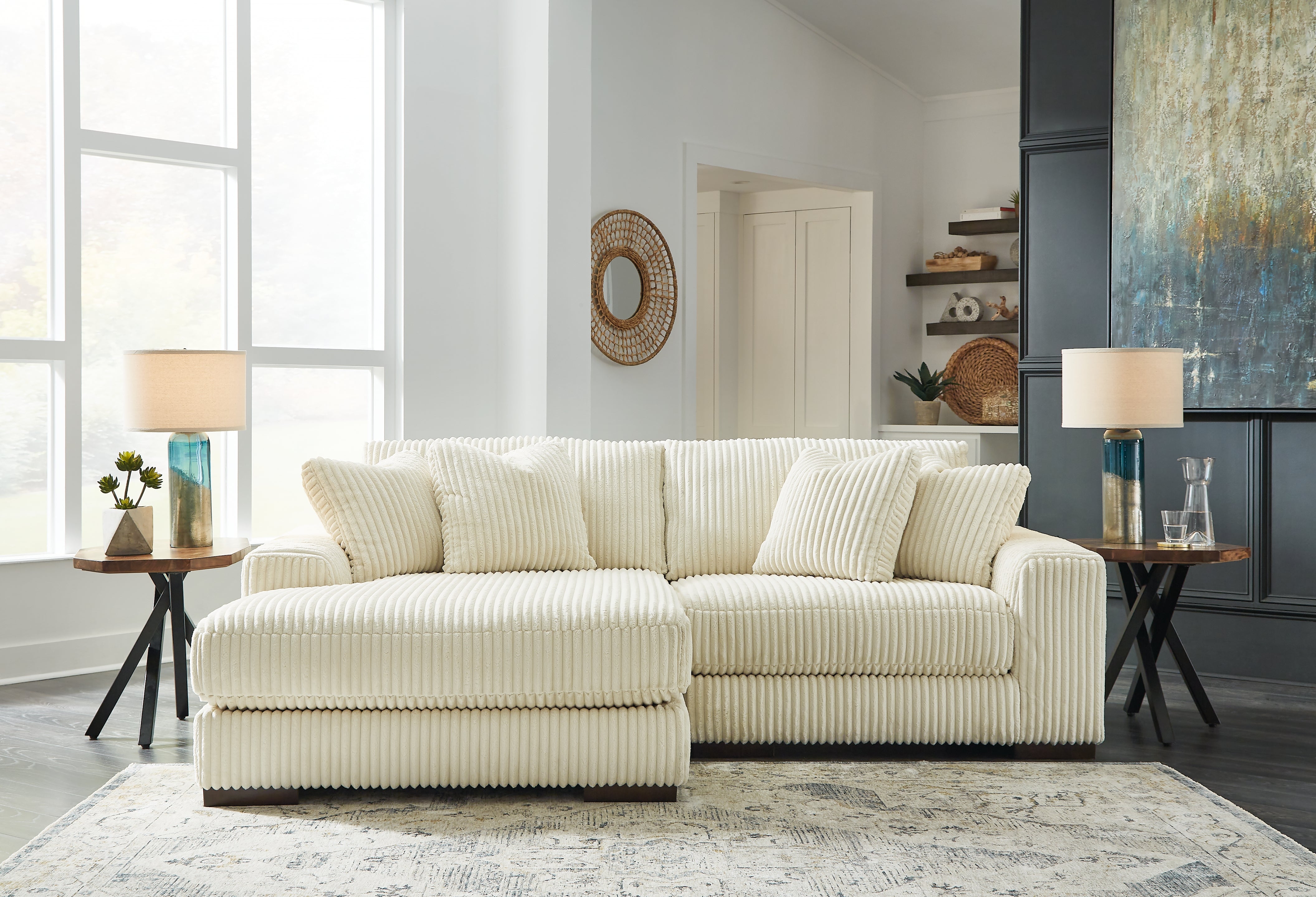 Diamond Furniture - Ashley Furniture - Lindyn 2-Piece Sectional with Chaise - RAF 2-Piece Sectional with Chaise / Ivory - 21104S3