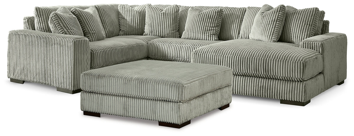 Diamond Furniture - Ashley Furniture - Lindyn 4-Piece Sectional with Chaise and Oversized Accent Ottoman - 4-Piece Sectional with Chaise and Oversized Accent Ottoman - 21105U12