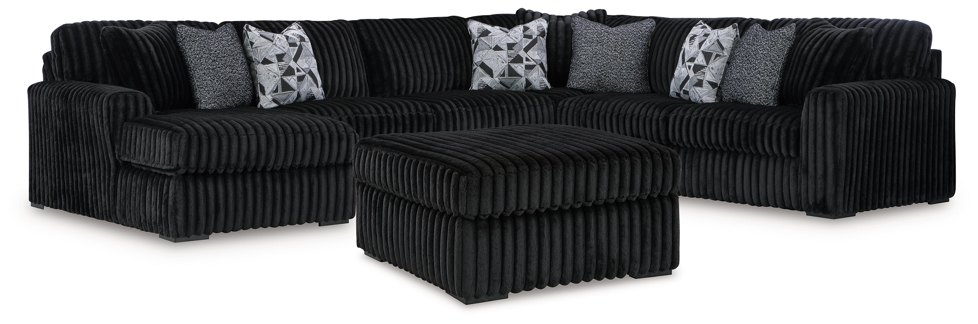 Diamond Furniture - Ashley Furniture - Midnight-Madness 4-Piece Sectional and Ottoman - 4-Piece Sectional and Ottoman - 98103U6