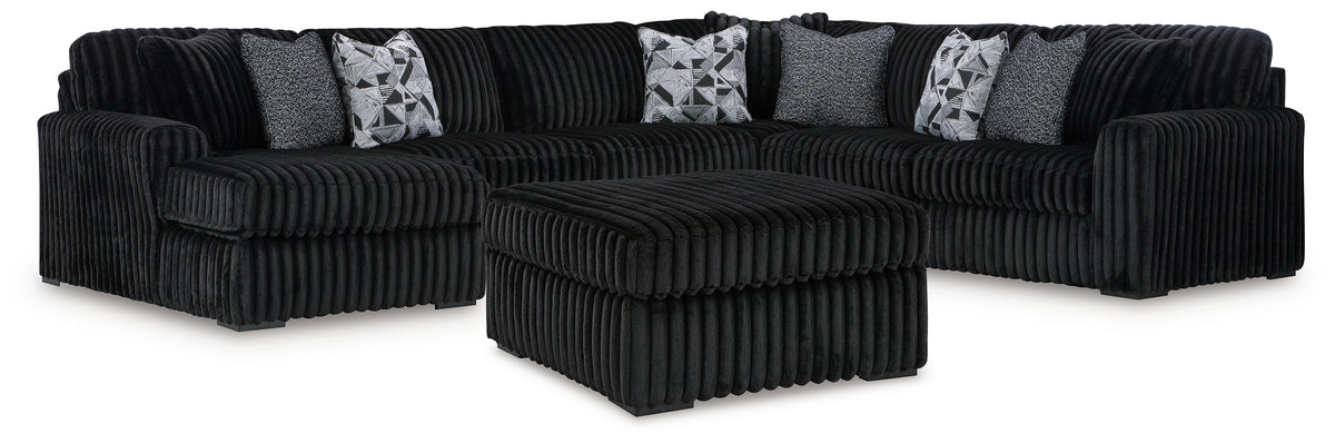 Diamond Furniture - Ashley Furniture - Midnight-Madness 4-Piece Sectional and Ottoman - 4-Piece Sectional and Ottoman - 98103U6