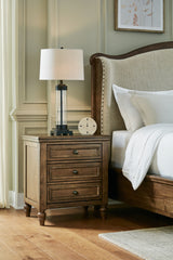 Diamond Furniture - Ashley Furniture - Sturlayne Bedroom - Queen Upholstered Panel Bed / Brown - B787B2