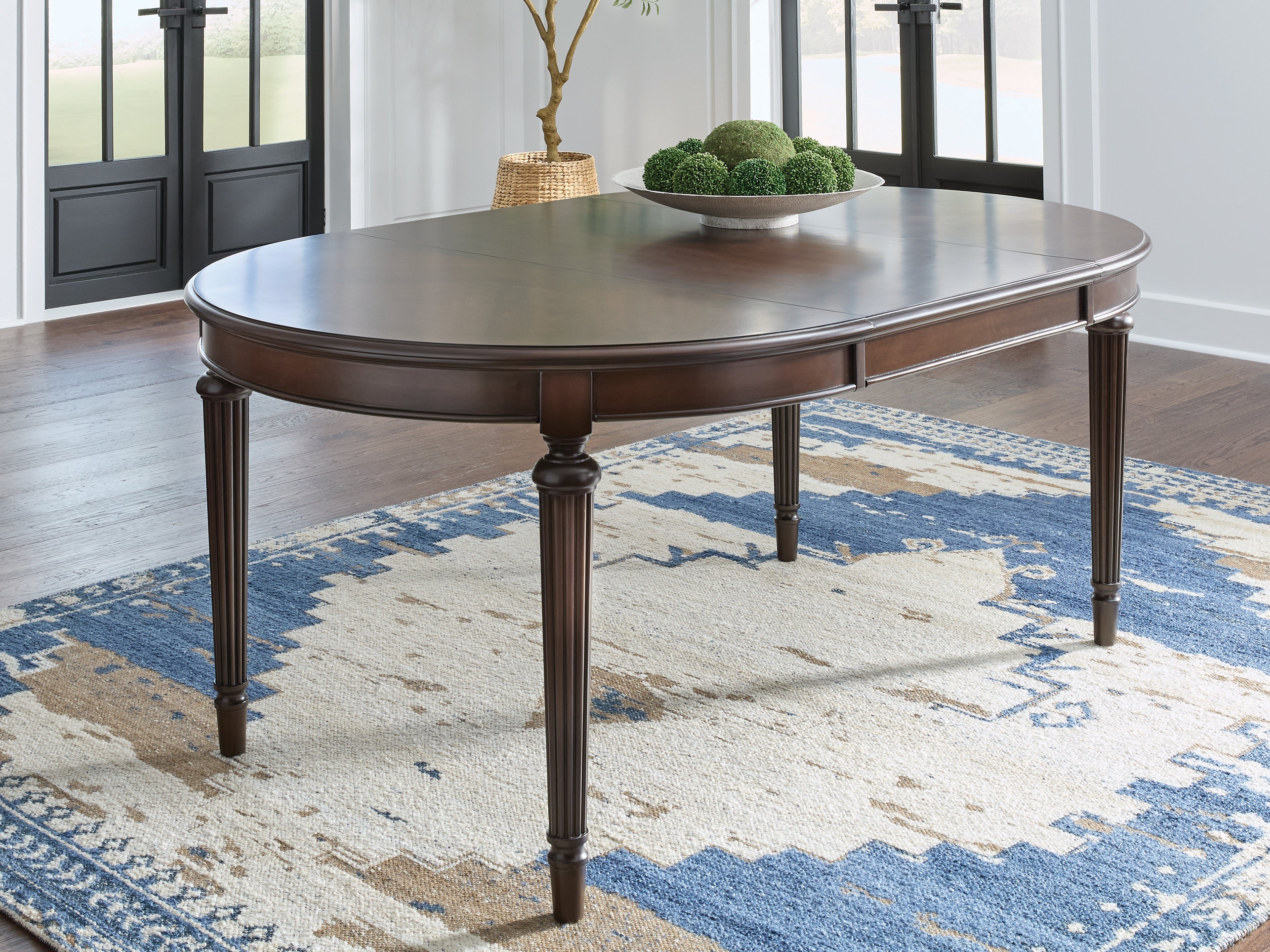 Diamond Furniture - Ashley Furniture - Lavinton Dining Room - Oval Dining Room EXT Table / Brown - D764-35