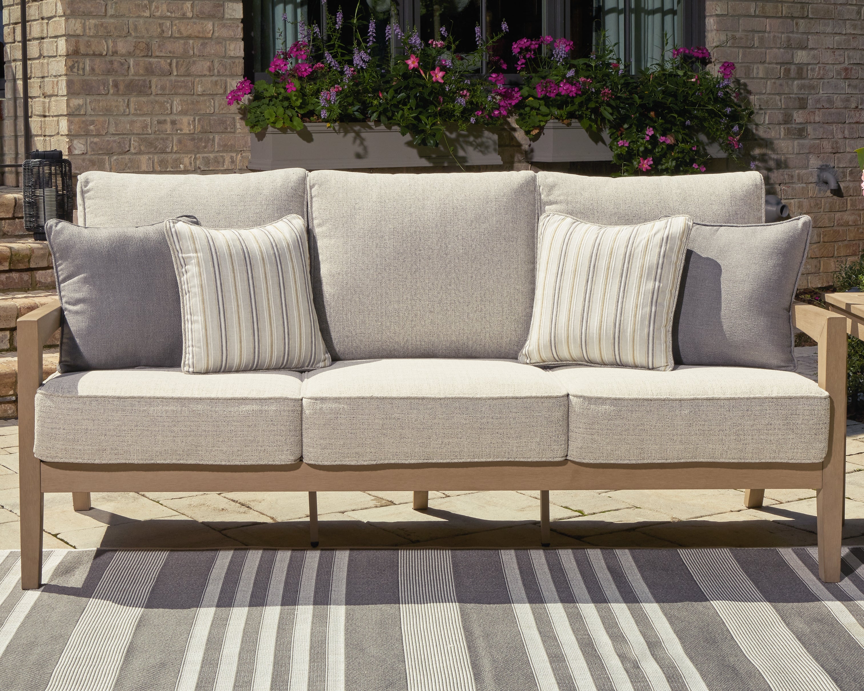 Diamond Furniture - Ashley Furniture - Hallow Creek Outdoor - Sofa with Cushion / Driftwood - P560-838