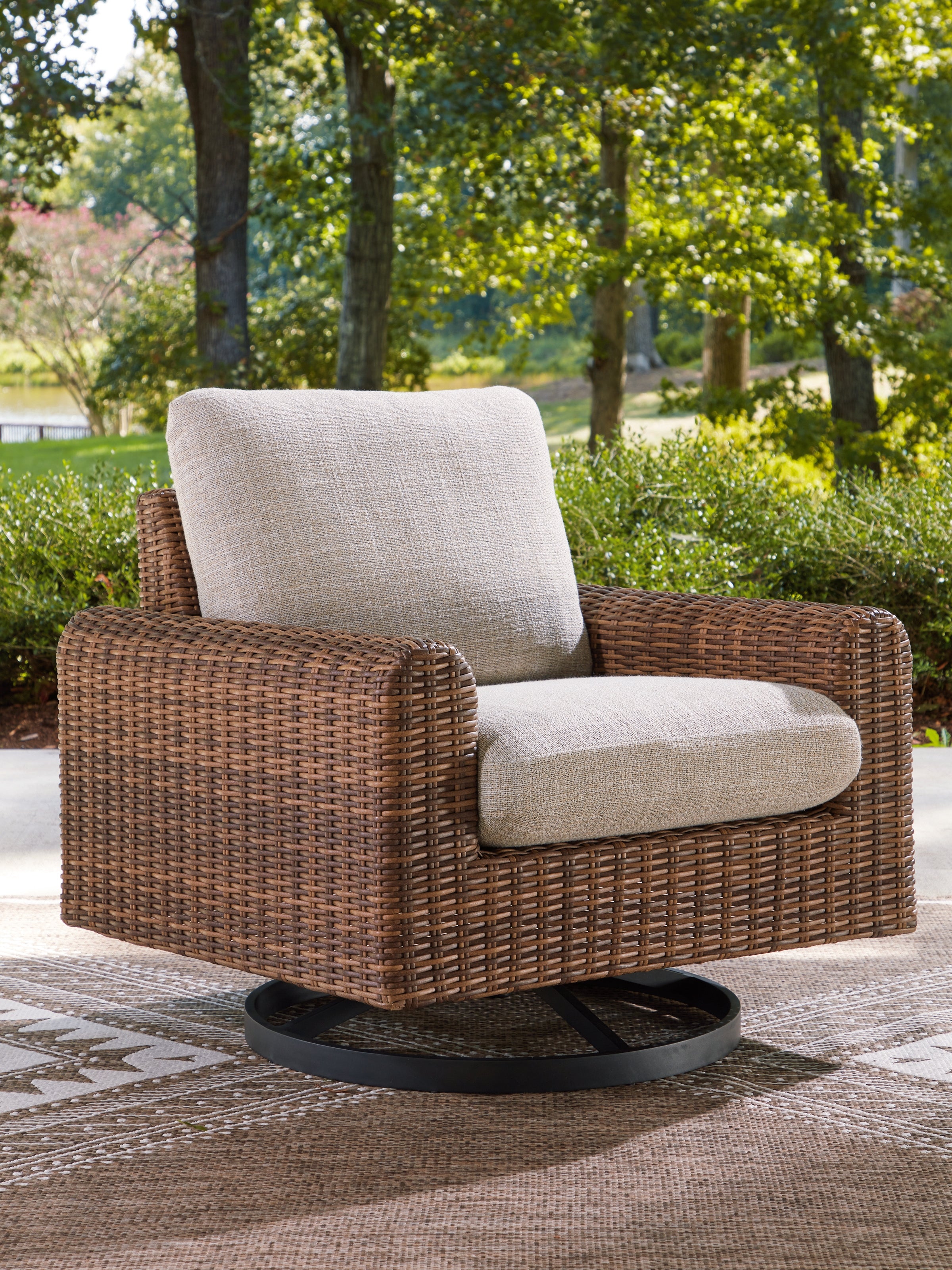 Diamond Furniture - Ashley Furniture - Dolan Creek Outdoor - Swivel Lounge w/ Cushion / Gray/Brown - PCP610-821