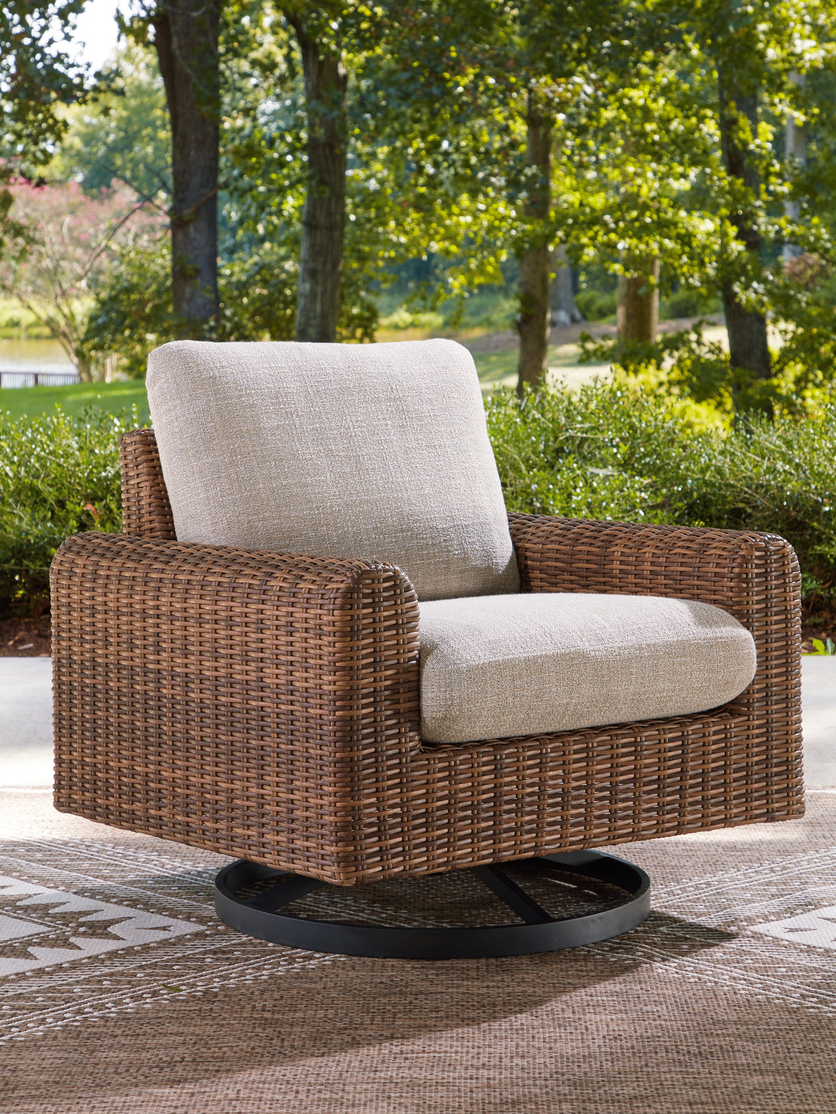 Diamond Furniture - Ashley Furniture - Dolan Creek Outdoor Swivel Lounge Chair with Cushion - Swivel Lounge w/ Cushion - PCP610-821