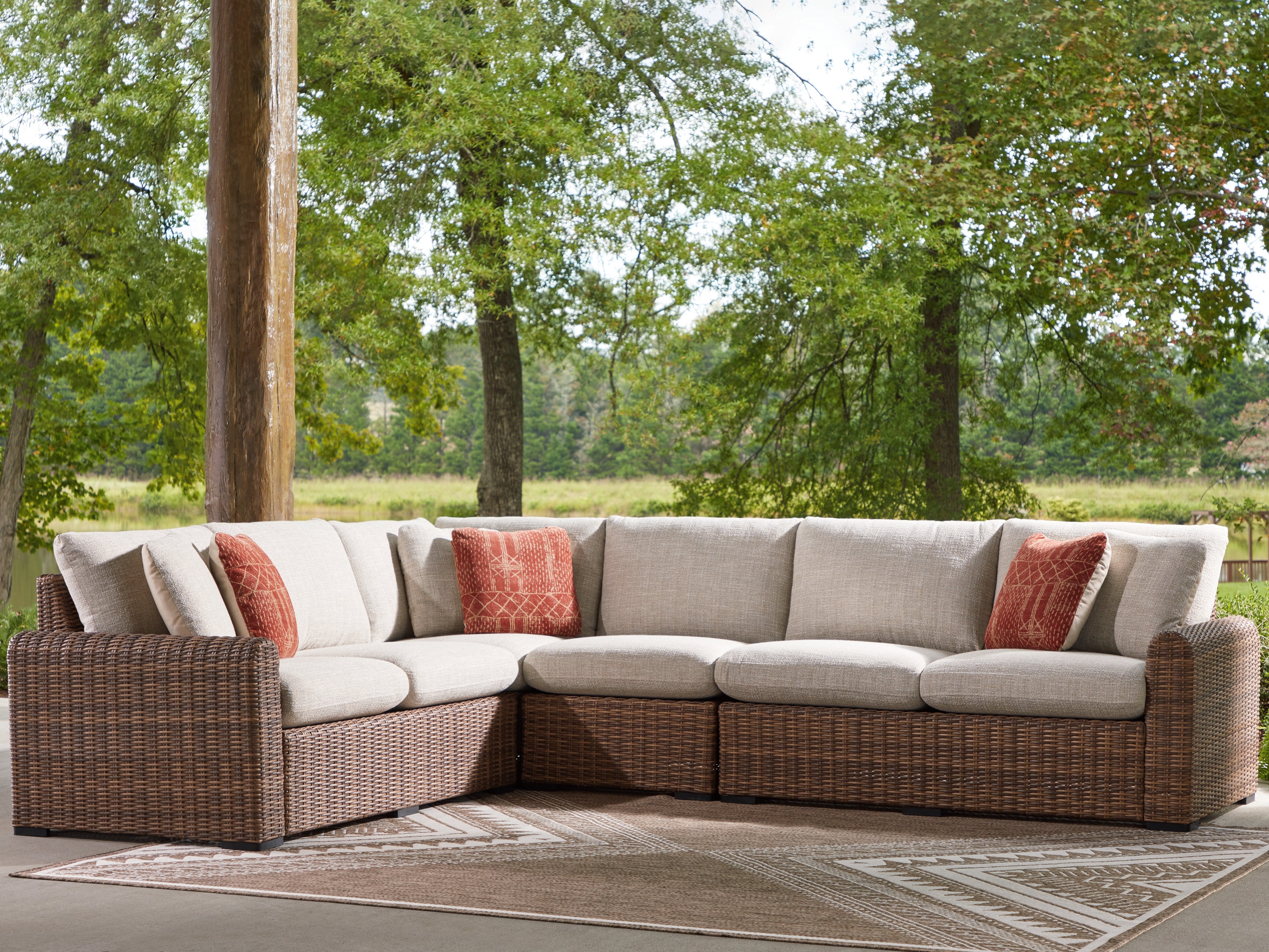 Diamond Furniture - Ashley Furniture - Dolan Creek Outdoor - 4-Piece Outdoor Sectional / Beige/Brown - PCP610P2