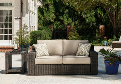 Diamond Furniture - Ashley Furniture - Coastline Bay Outdoor - Ottoman with Cushion / Brown - P784-814