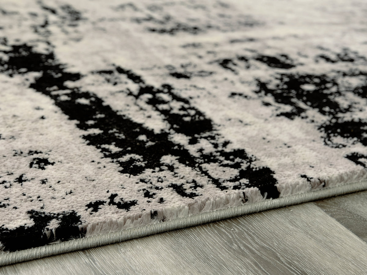 Diamond Furniture - Ashley Furniture - Zekeman 5'3" x 7'7" Rug - 5'3" x 7'7" Rug / Black/Cream/Gray - R404922
