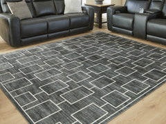 Diamond Furniture - Ashley Furniture - Elderland Rug - Washable 5' x 7' Area Rug / Black/Gray - R407402