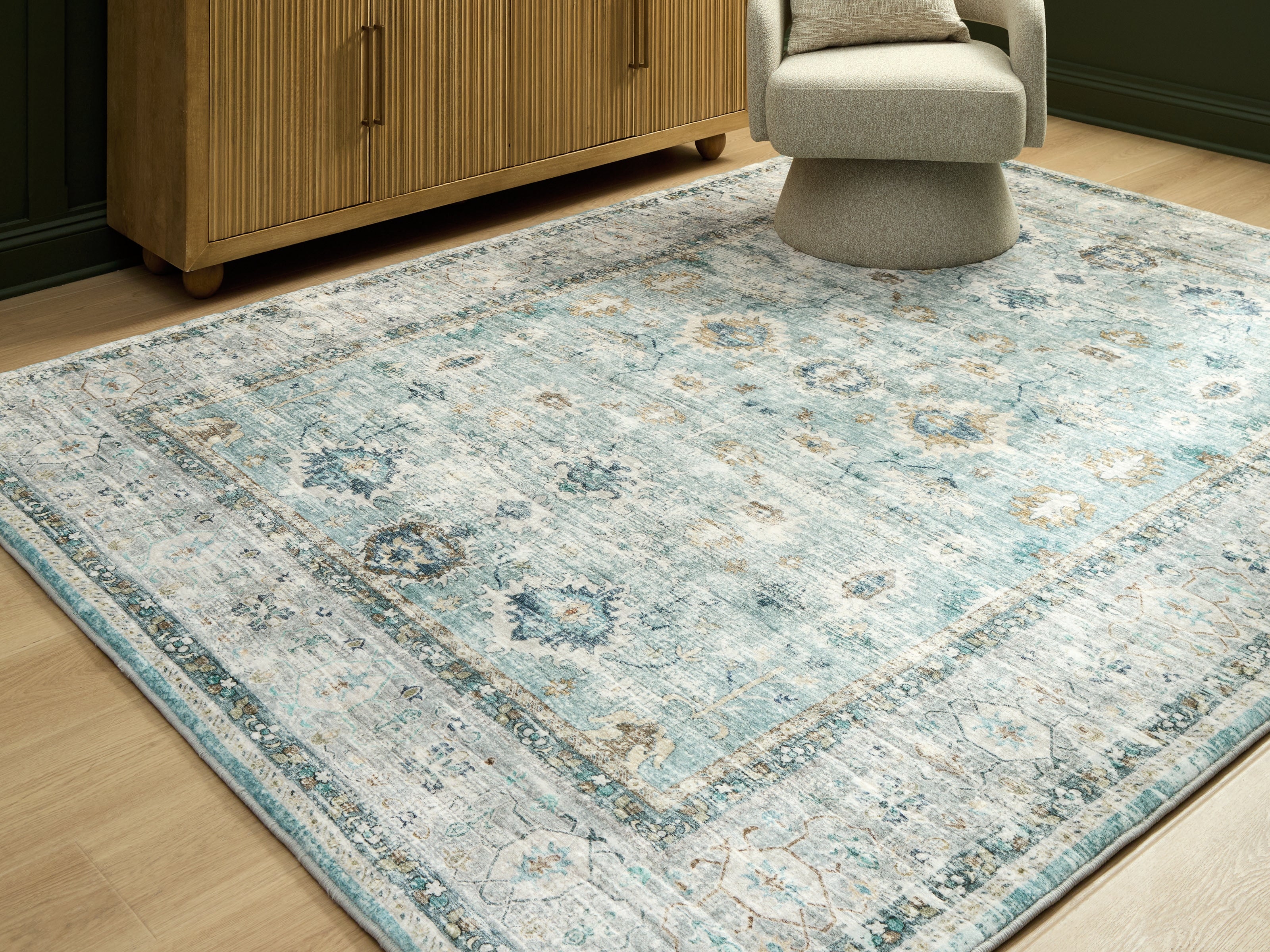 Diamond Furniture - Ashley Furniture - Ladstoney Rug - 5' x 7' Area Rug / Teal/Beige/Ochre - R407502