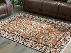 Diamond Furniture - Ashley Furniture - Qaabiz Rug - 5' x 7' Area Rug / Sienna/Ivory/Black - R407522