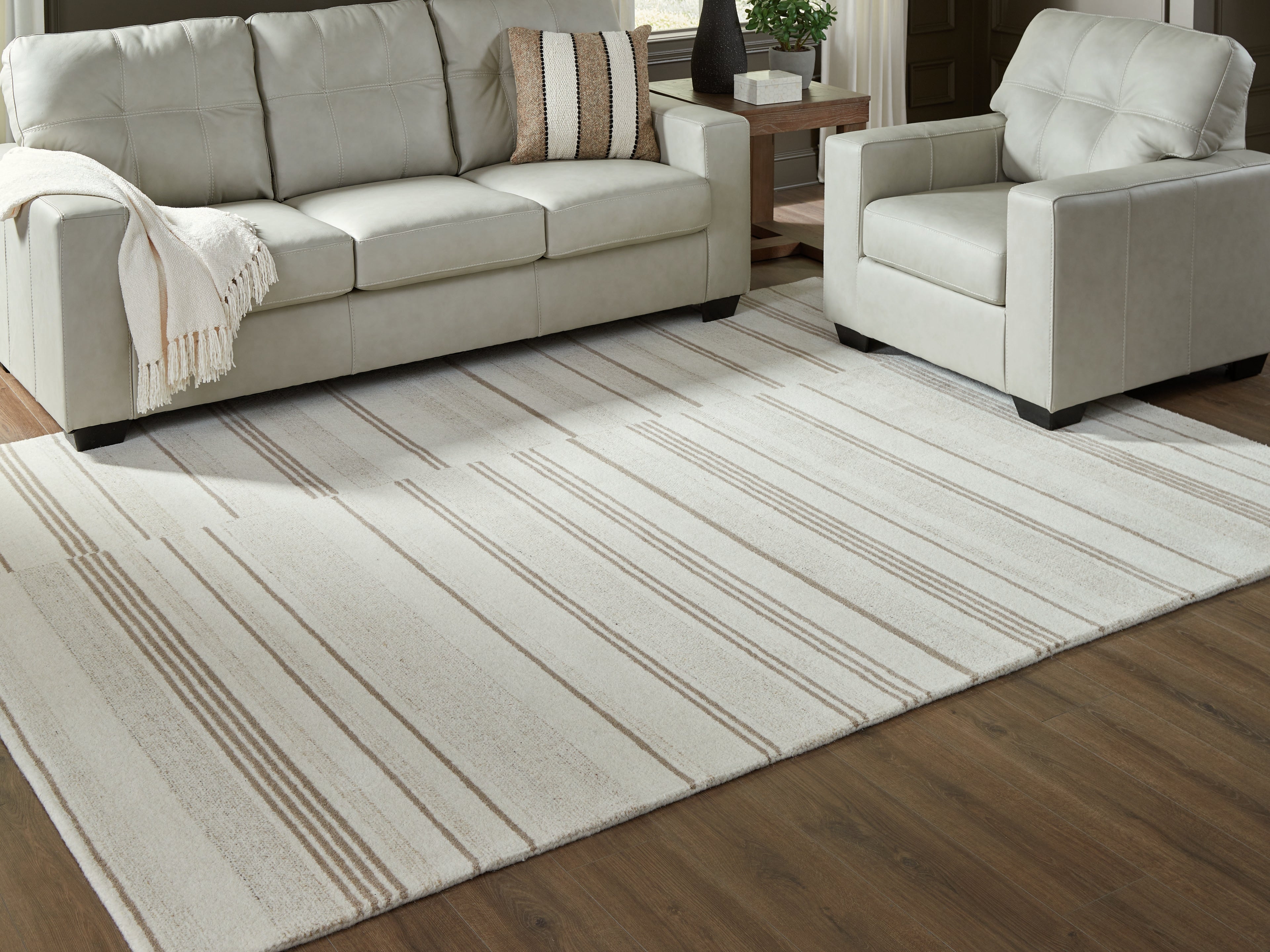 Diamond Furniture - Ashley Furniture - Gadence 7'8" x 10' Area Rug - 7'8" x 10' Area Rug / Ivory/Tan - R407641