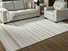Diamond Furniture - Ashley Furniture - Gadence 7'8" x 10' Area Rug - 7'8" x 10' Area Rug / Ivory/Tan - R407641