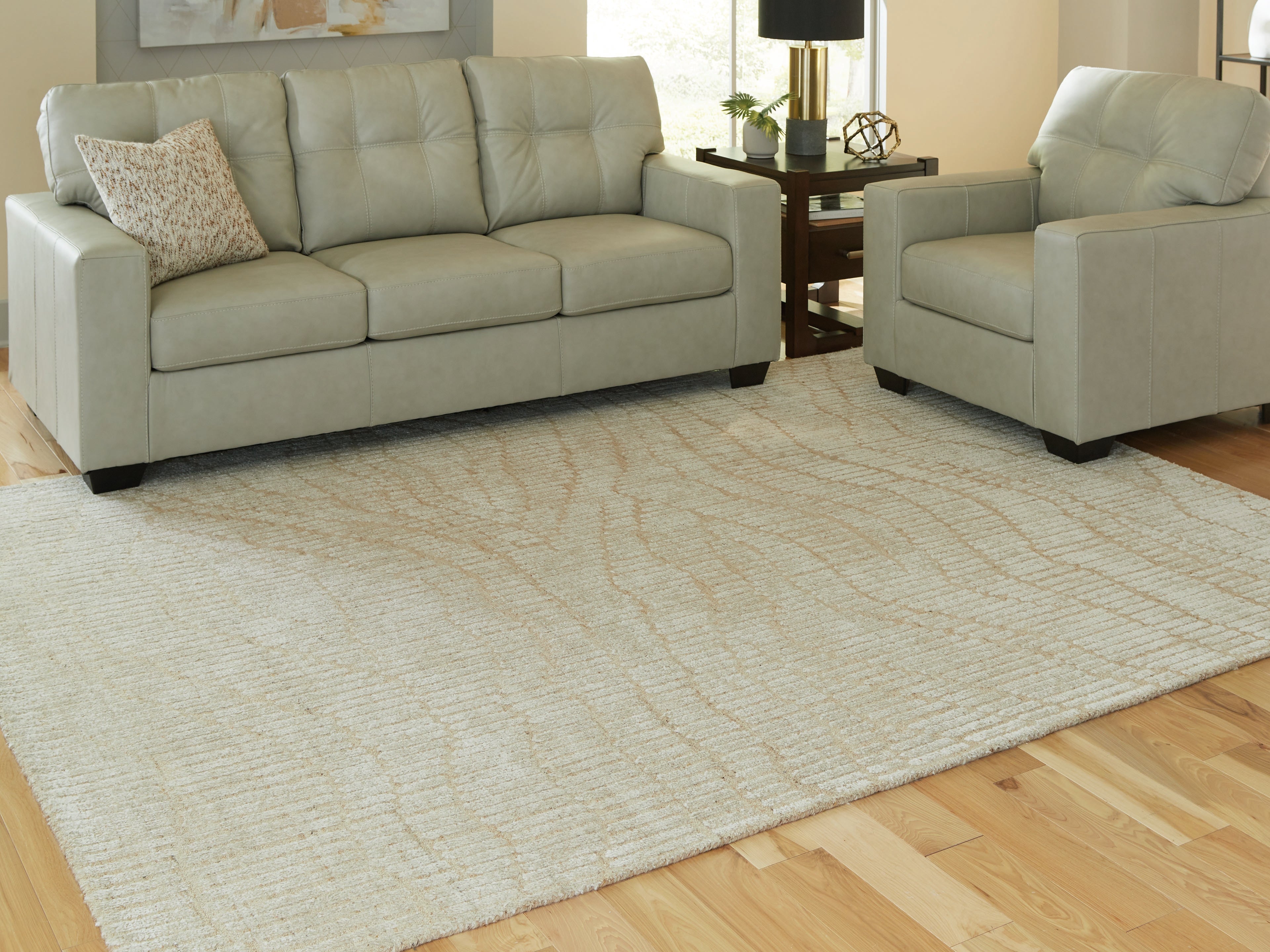 Diamond Furniture - Ashley Furniture - Jaseena Rug - 7'8" x 10' Area Rug / Beige/Tan - R407721