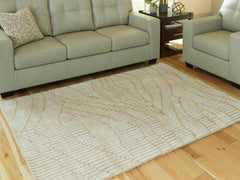Diamond Furniture - Ashley Furniture - Jaseena Rug - 7'8" x 10' Area Rug / Beige/Tan - R407721
