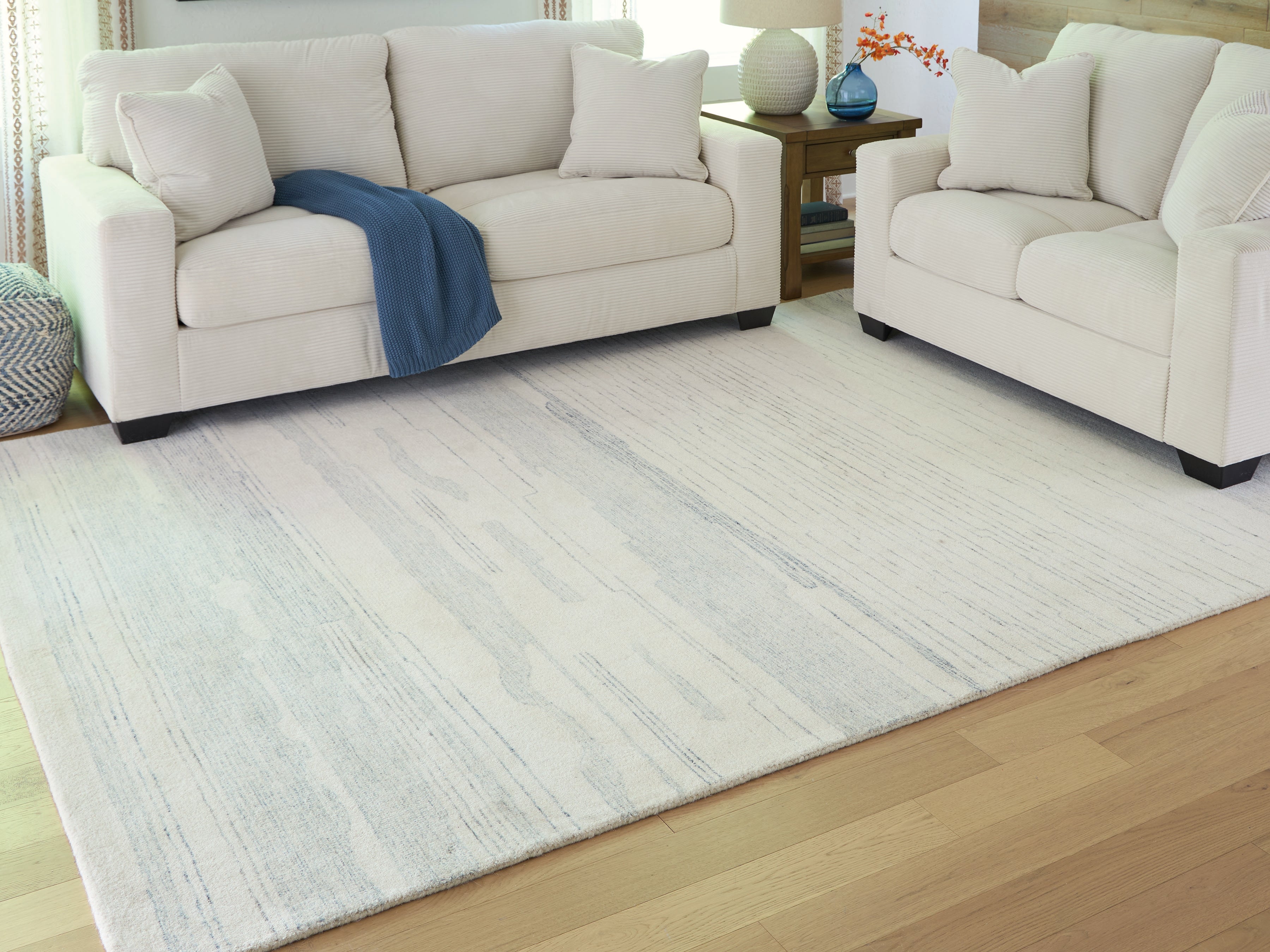 Diamond Furniture - Ashley Furniture - Genemost Rug - 7'8" x 10' Area Rug / Ivory/Blue - R407841