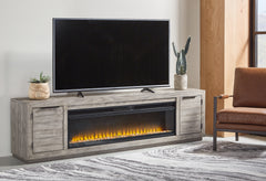 Diamond Furniture - Ashley Furniture - Naydell 92" TV Stand with Electric Fireplace - 92" TV Stand with Electric Fireplace / Gray - W996W1
